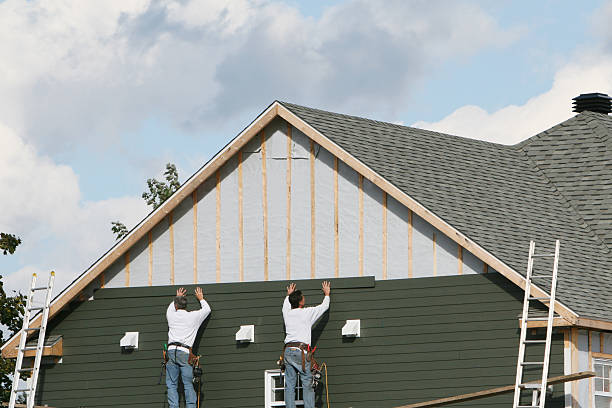 Professional Siding technician working in Waxhaw, NC